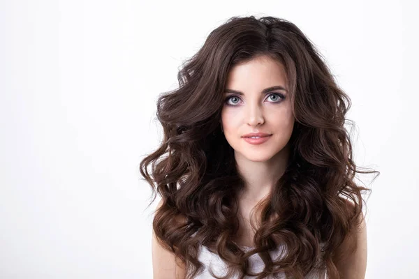 Portrait of beautiful girl with luxuriant hair curling. — Stock Photo, Image