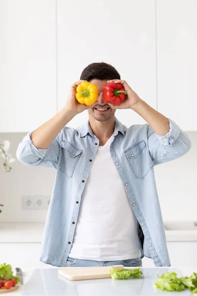Handsome Young Man Holding Fresh Yellow Red Pepper Smiling While — Stock Photo, Image