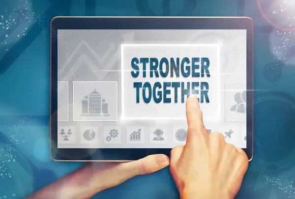 Une Main Sélectionnant Concept Entreprise Stronger Together Sur Écran Tablette — Photo