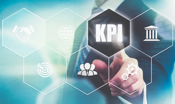 Een Zakenman Hand Een Kpi Concept Knop Een Futuristische Computerscherm — Stockfoto