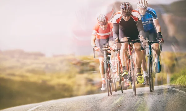 Cyclists out racing along country lanes — Stock Photo, Image