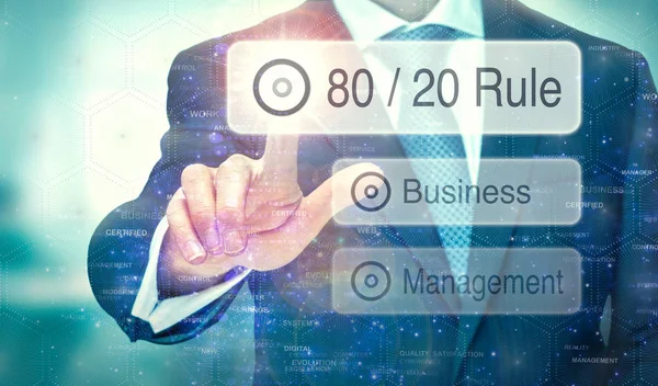 A businessman selecting a button on a futuristic display with a — Stock Photo, Image