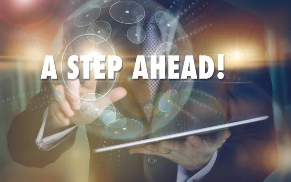 Une main sélectionnant un A Step Ahead concept d'entreprise sur un futuriste — Photo