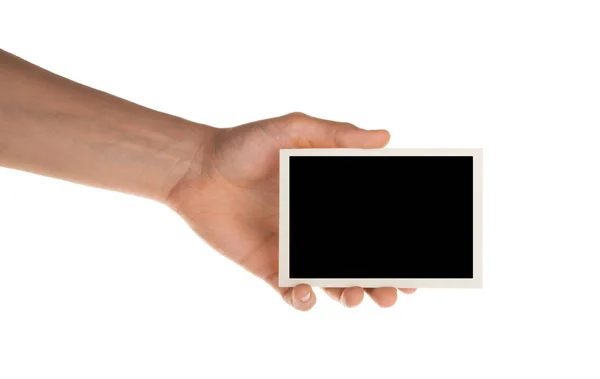 Hand hält Fotorahmen isoliert auf Weiß mit Clipping-Pfad — Stockfoto