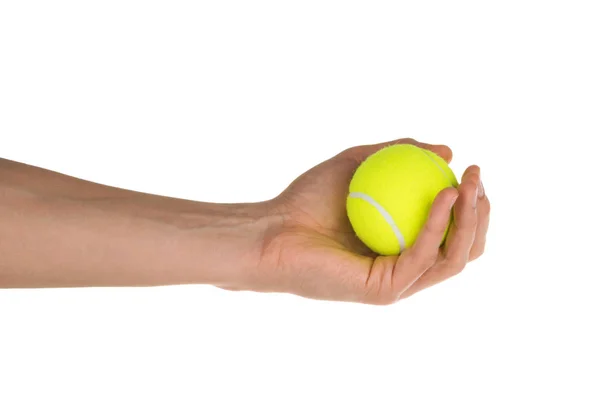 Hand met tennisbal geïsoleerd op witte uitknippad — Stockfoto