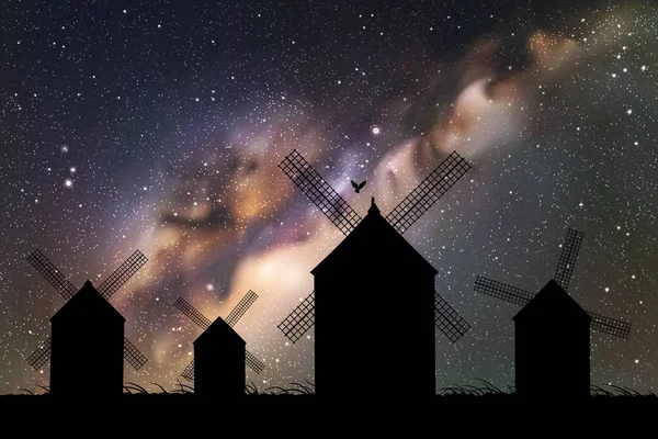 夜间在田野的风车 — 图库矢量图片
