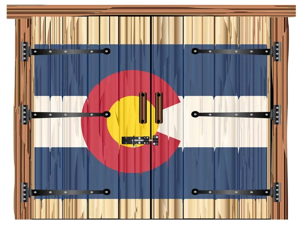 Stängda ladugårdsdörr med Colorado flagga — Stock vektor
