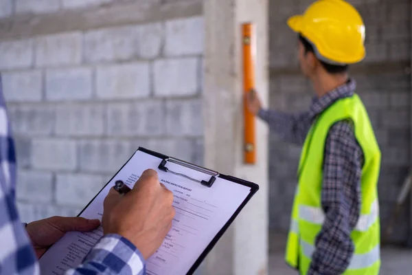 Construction Inspector Team Inspected Marked Standard Wall Level Site — Stock Photo, Image