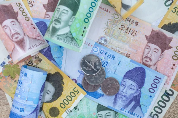 Korean won notes and Korean won coins for money concept background