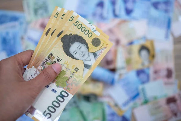 South Korean won currency money exchange. Finance business currency exchange and money concept.
