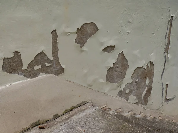 Damage to a wall background