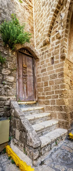 Old wooden door with stairs in Old Jaffa, Israel