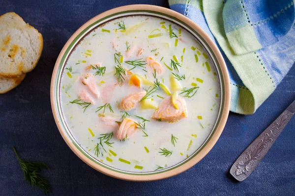 Salmon soup. Creamy  salmon fish soup in bowl. overhead, horizontal