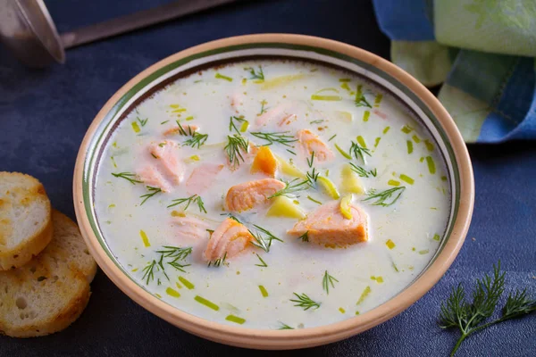 Salmon soup. Creamy  salmon fish soup in bowl. horizontal