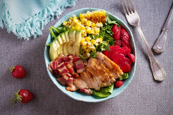 Chicken Cobb Salad. Chicken bacon avocado strawberry and sweet corn salad - healthy food