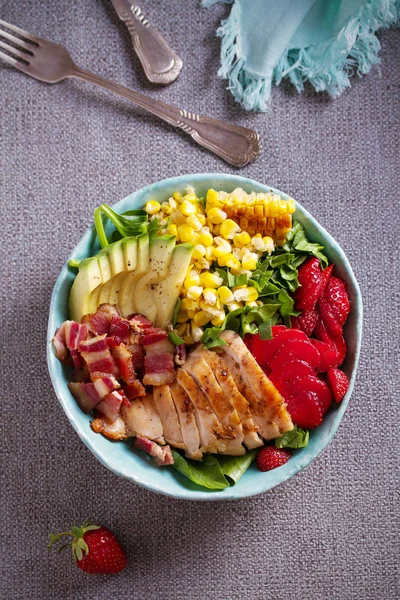 Chicken Cobb Salad. Chicken bacon avocado strawberry and sweet corn salad - healthy food