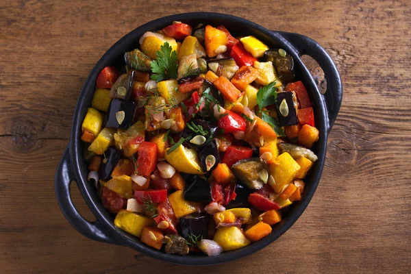 Vegetable stew: eggplant, pepper, tomato, zucchini, carrot and onion. Stewed vegetable salad