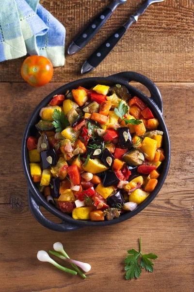 Vegetable stew: eggplant, pepper, tomato, zucchini, carrot and onion. Stewed vegetable salad