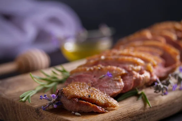 Duck breast on serving board. Duck breast fillet steak