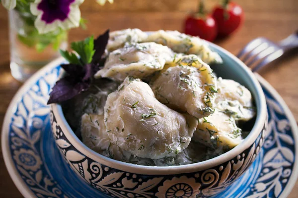 Dumplings Filled Potato Sour Cream Blue Bowl Wooden Table — Stock Photo, Image