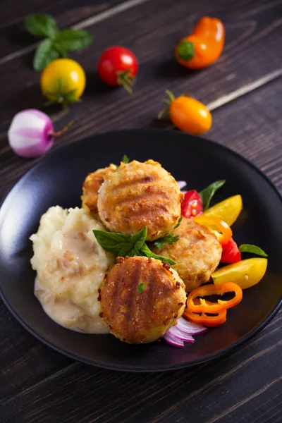 Fish Cakes Mashed Potatoes Vegetables Garnished Basil Fish Burgers Black — Stock Photo, Image