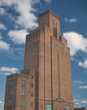 The art deco brick ventilation tower of the Queensway road tunnel under the River Mersey, in Birkenhead, Wirral, UK clipart