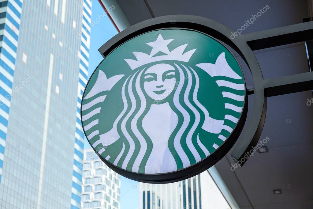 Hong Kong, China - December 18, 2018: Starbucks sign outside a coffee shop in Hong kong. Starbucks Corporation is an American coffee company and the largest coffeehouse company in the world.