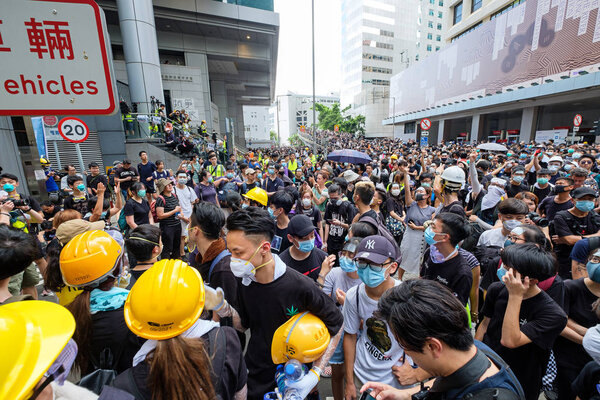 Wanchai, HONG KONG - June 21, 2019: Protest at Wanchai Hong Kong Police Headquarter. Protestors remembering the dead of protestor on June 15 2019.