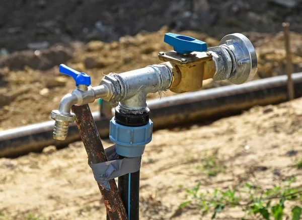 Metal water pipeline at the construction area