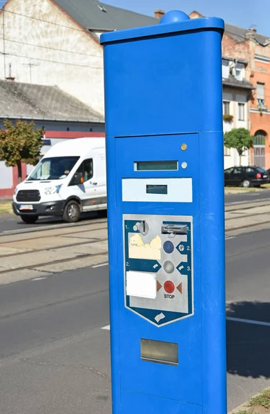 Parking ticket automat next to the street