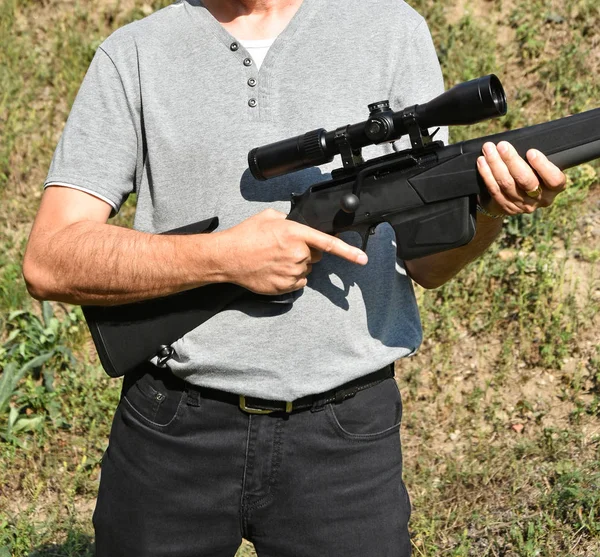 Man Stands Hand Large Shotgun — Stock Photo, Image