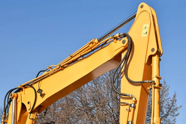 Part of the excavator at the road construction — Stock Photo, Image