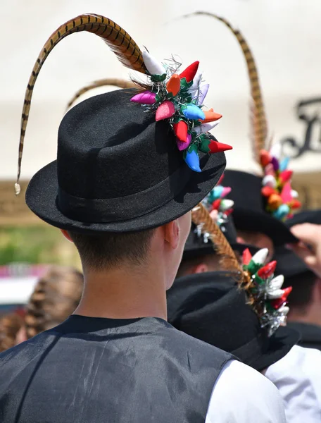 Folk dancer men in strange hat — Stock Photo, Image