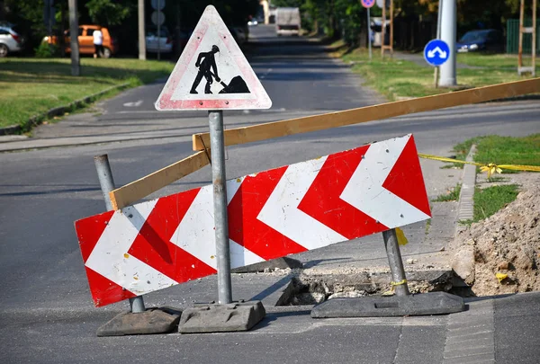 Road works and road barrier signs on the street