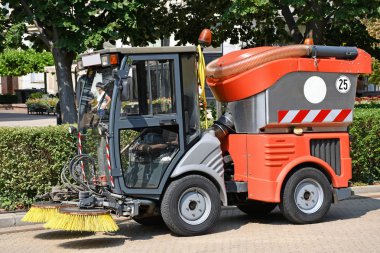Street cleaner machinery on the road clipart