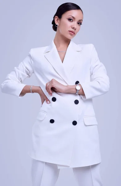 Gorgeous latin women in fashion white suit — Stock Photo, Image