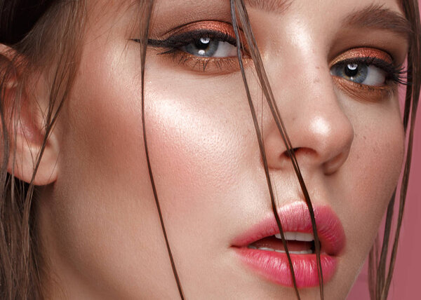 Beautiful girl with creative colorful makeup. Beauty face.