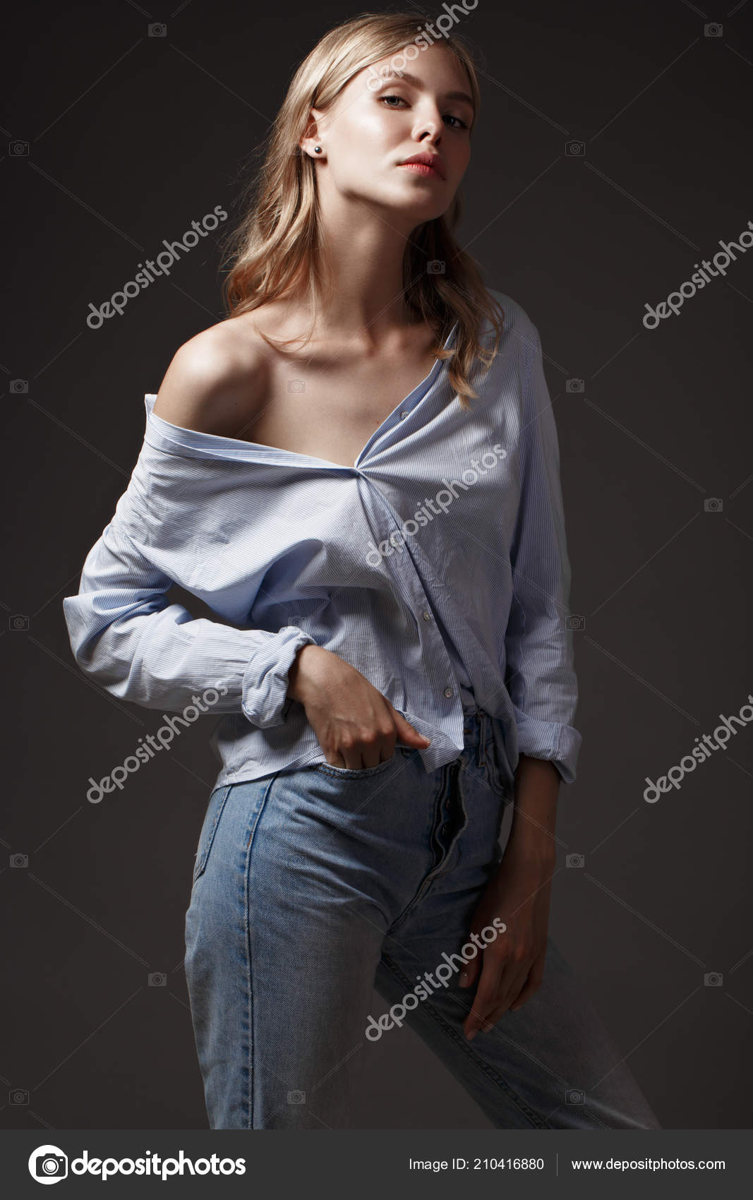 Fashion model with long hair, perfect skin is posing in studio for glamour  test photo shoot showing different poses Stock Photo by ©kobrin-photo  210416880