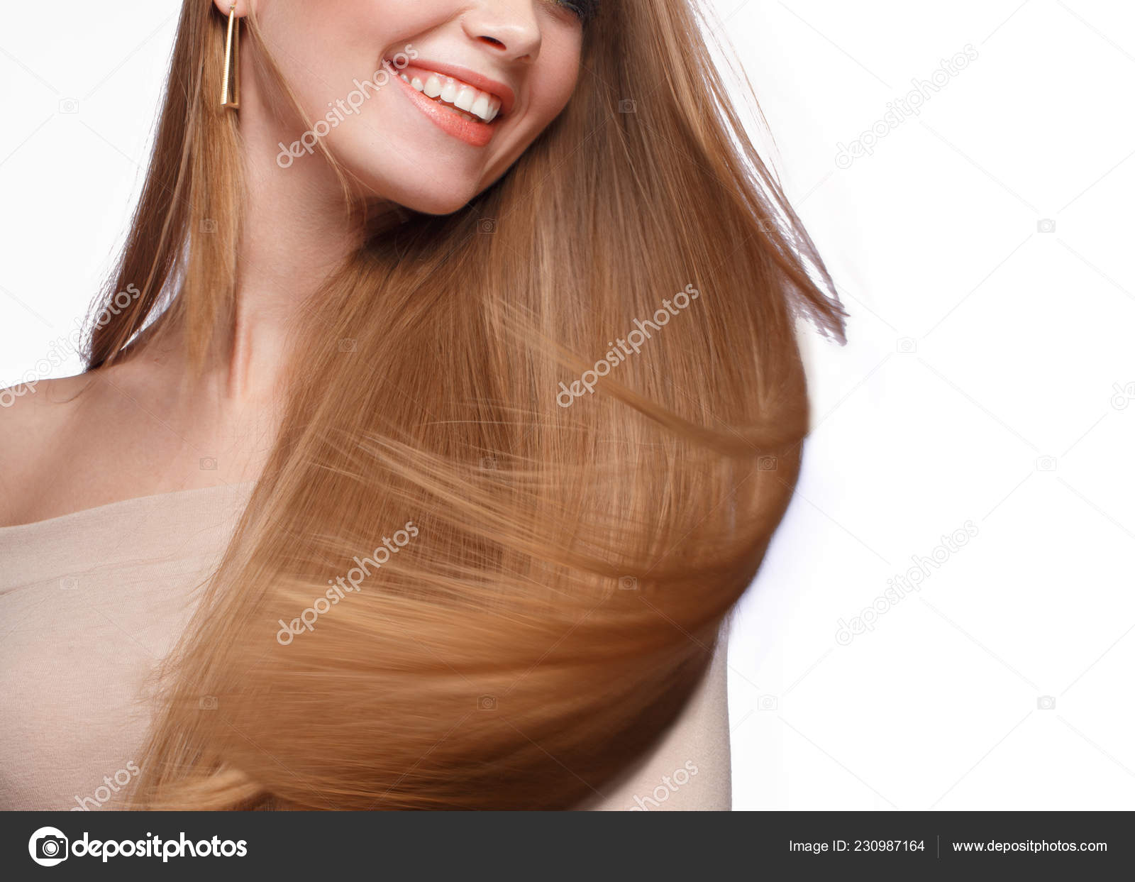 Beautiful blond girl with a perfectly smooth hair, classic make-up. Beauty  face Stock Photo by ©kobrin-photo 230987164