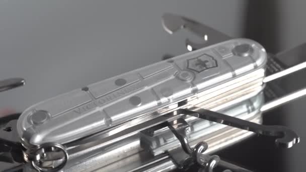 Cinematic Closed Shot Silver Colour Victorinox Swiss Army Knife — Stock Video