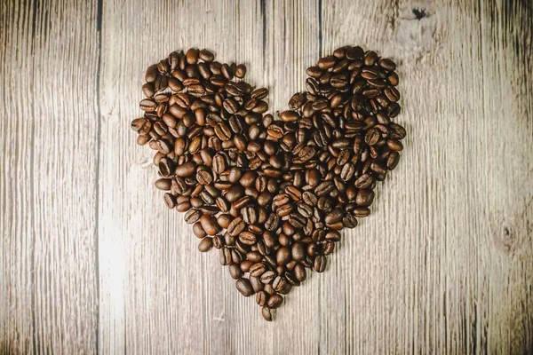 Handful Coffee Beans Shape Heart Close Roasted Heart Shaped Coffee — Stock Photo, Image