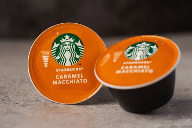 Illustrative editorial shot of Starbucks Caramel Macchiato coffee capsules clipart
