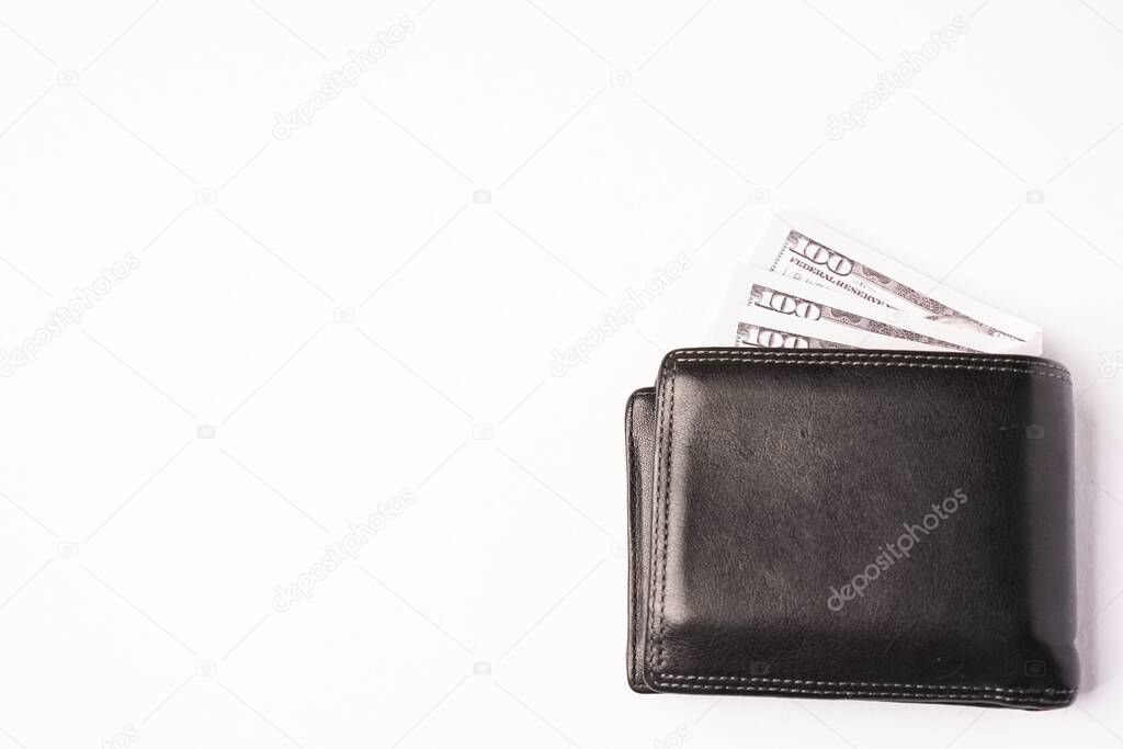 Empty notebook with wallets on white background. Copy space for text