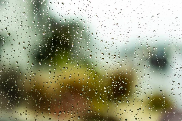 Σταγόνες Βροχής Στο Τζάμι Του Παραθύρου Φόντο Θολή — Φωτογραφία Αρχείου