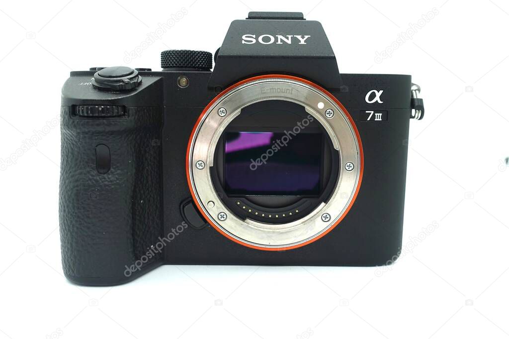Sony A7 mark iii against isolated white background. This 2018 mirrorless camera of the year is a fullframe mirrorless camera with a very compact size