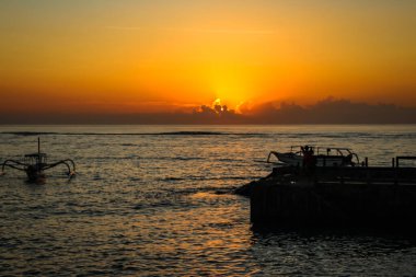 Sunrise at Sanur Sindhu Beach, Bali clipart