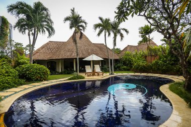 Impiana 'nın güzel lüks villası Er Villas Seminyak. Güzel villaları ve özel yüzme havuzu olan harika bir yer.