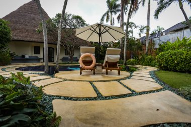 Impiana 'nın güzel lüks villası Er Villas Seminyak. Güzel villaları ve özel yüzme havuzu olan harika bir yer.
