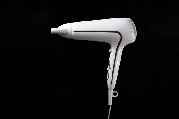 Professional stylish hairdryer isolated over a black background. White Ionic Hair Dryer with Hair Care Tool. Modern Blow Dryer. — Stock Photo, Image