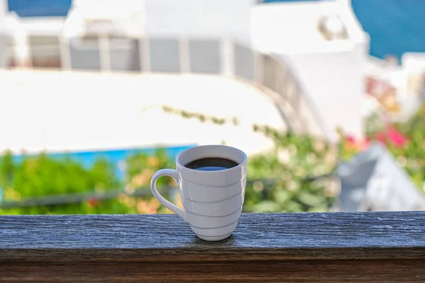 Coffee cup coffee cups in wooden balcony terrace with sea view — Stock Photo, Image